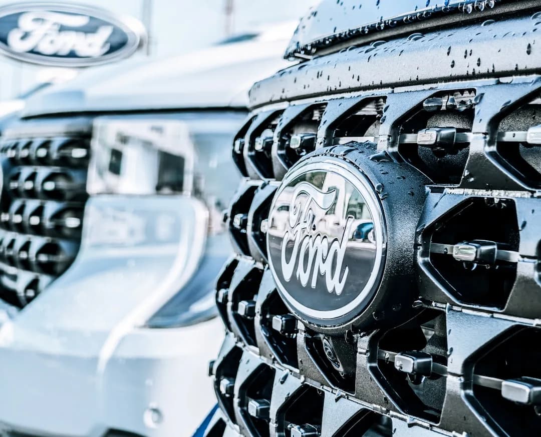 Ford electric pickup charging at a public station